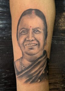 Mom face tattoo