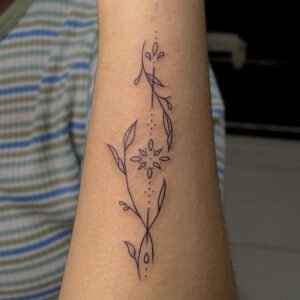 floral leaves tattoo