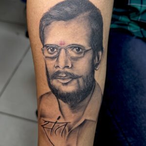 sant face tattoo